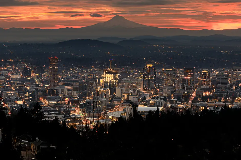 Stunning Portland skyline at sunset with Mount Hood in the background.