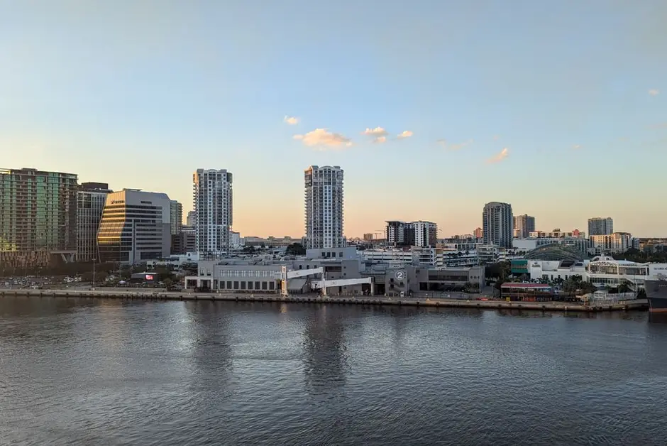 Downtown Tampa across the Hillsborough River at sundown, the towers catching the last light.